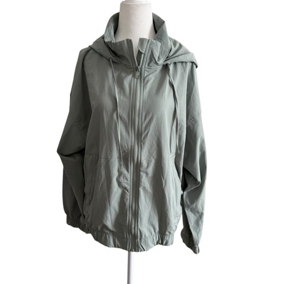 Eddie Bauer Jackets & Blazers - Eddie Bauer NWOT Green Windbreaker Hidden Hood Zipper Jacket Athletic apparel M